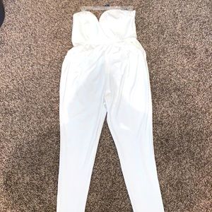 Woman’s all white strapless jumpsuit